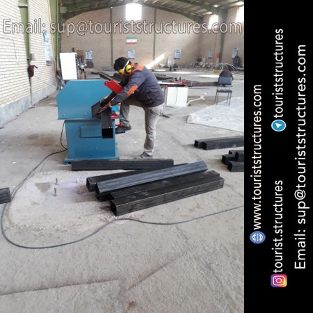 construction, color and carrying the structure, Location of metal frame factory (derrick and structures) of the aerial restaurant project in Ferdows Garden of Isfahan, Pasargad’s professional forces in welding, cutting and assembly at the factory, Steps to build the derrick for the aerial restaurant inside the factory in project of Ferdows Garden, Isfahan, Painting of project structures (with polyurethane paint, 120 microns thick) inside the factory in Ferdows Garden, Isfahan, Carrying of the project structures from the factory to the project site (in Ferdows Garden, Isfahan)