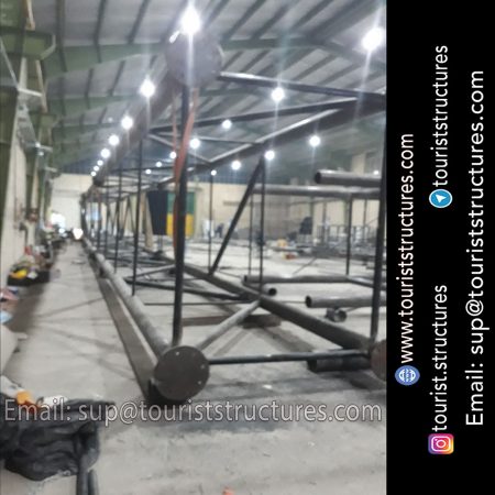 construction, color and carrying the structure, Location of metal frame factory (derrick and structures) of the aerial restaurant project in Ferdows Garden of Isfahan, Pasargad’s professional forces in welding, cutting and assembly at the factory, Steps to build the derrick for the aerial restaurant inside the factory in project of Ferdows Garden, Isfahan, Painting of project structures (with polyurethane paint, 120 microns thick) inside the factory in Ferdows Garden, Isfahan, Carrying of the project structures from the factory to the project site (in Ferdows Garden, Isfahan)