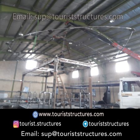 construction, color and carrying the structure, Location of metal frame factory (derrick and structures) of the aerial restaurant project in Ferdows Garden of Isfahan, Pasargad’s professional forces in welding, cutting and assembly at the factory, Steps to build the derrick for the aerial restaurant inside the factory in project of Ferdows Garden, Isfahan, Painting of project structures (with polyurethane paint, 120 microns thick) inside the factory in Ferdows Garden, Isfahan, Carrying of the project structures from the factory to the project site (in Ferdows Garden, Isfahan)