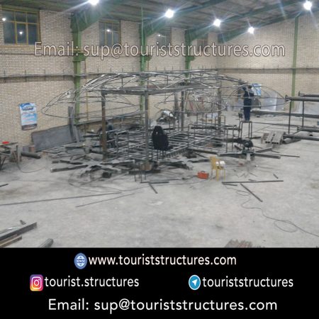 construction, color and carrying the structure, Location of metal frame factory (derrick and structures) of the aerial restaurant project in Ferdows Garden of Isfahan, Pasargad’s professional forces in welding, cutting and assembly at the factory, Steps to build the derrick for the aerial restaurant inside the factory in project of Ferdows Garden, Isfahan, Painting of project structures (with polyurethane paint, 120 microns thick) inside the factory in Ferdows Garden, Isfahan, Carrying of the project structures from the factory to the project site (in Ferdows Garden, Isfahan)