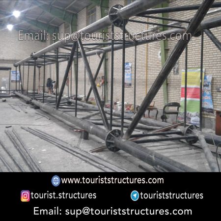 construction, color and carrying the structure, Location of metal frame factory (derrick and structures) of the aerial restaurant project in Ferdows Garden of Isfahan, Pasargad’s professional forces in welding, cutting and assembly at the factory, Steps to build the derrick for the aerial restaurant inside the factory in project of Ferdows Garden, Isfahan, Painting of project structures (with polyurethane paint, 120 microns thick) inside the factory in Ferdows Garden, Isfahan, Carrying of the project structures from the factory to the project site (in Ferdows Garden, Isfahan)