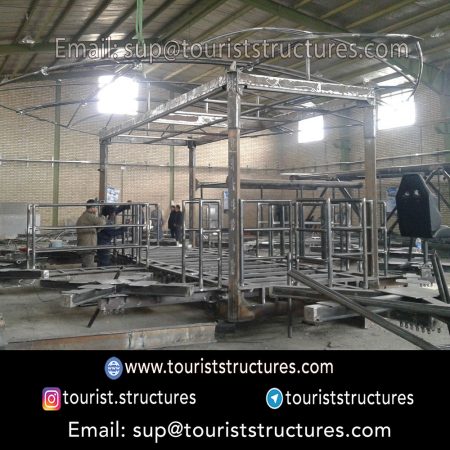 construction, color and carrying the structure, Location of metal frame factory (derrick and structures) of the aerial restaurant project in Ferdows Garden of Isfahan, Pasargad’s professional forces in welding, cutting and assembly at the factory, Steps to build the derrick for the aerial restaurant inside the factory in project of Ferdows Garden, Isfahan, Painting of project structures (with polyurethane paint, 120 microns thick) inside the factory in Ferdows Garden, Isfahan, Carrying of the project structures from the factory to the project site (in Ferdows Garden, Isfahan)