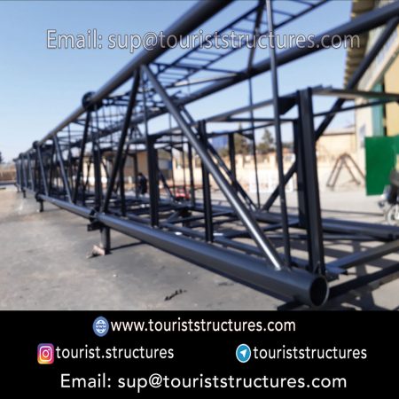 construction, color and carrying the structure, Location of metal frame factory (derrick and structures) of the aerial restaurant project in Ferdows Garden of Isfahan, Pasargad’s professional forces in welding, cutting and assembly at the factory, Steps to build the derrick for the aerial restaurant inside the factory in project of Ferdows Garden, Isfahan, Painting of project structures (with polyurethane paint, 120 microns thick) inside the factory in Ferdows Garden, Isfahan, Carrying of the project structures from the factory to the project site (in Ferdows Garden, Isfahan)