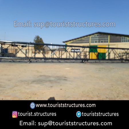 construction, color and carrying the structure, Location of metal frame factory (derrick and structures) of the aerial restaurant project in Ferdows Garden of Isfahan, Pasargad’s professional forces in welding, cutting and assembly at the factory, Steps to build the derrick for the aerial restaurant inside the factory in project of Ferdows Garden, Isfahan, Painting of project structures (with polyurethane paint, 120 microns thick) inside the factory in Ferdows Garden, Isfahan, Carrying of the project structures from the factory to the project site (in Ferdows Garden, Isfahan)